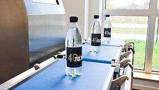 Industriewaage von Teltek zur Gewichtsprüfung von Getränkeflaschen